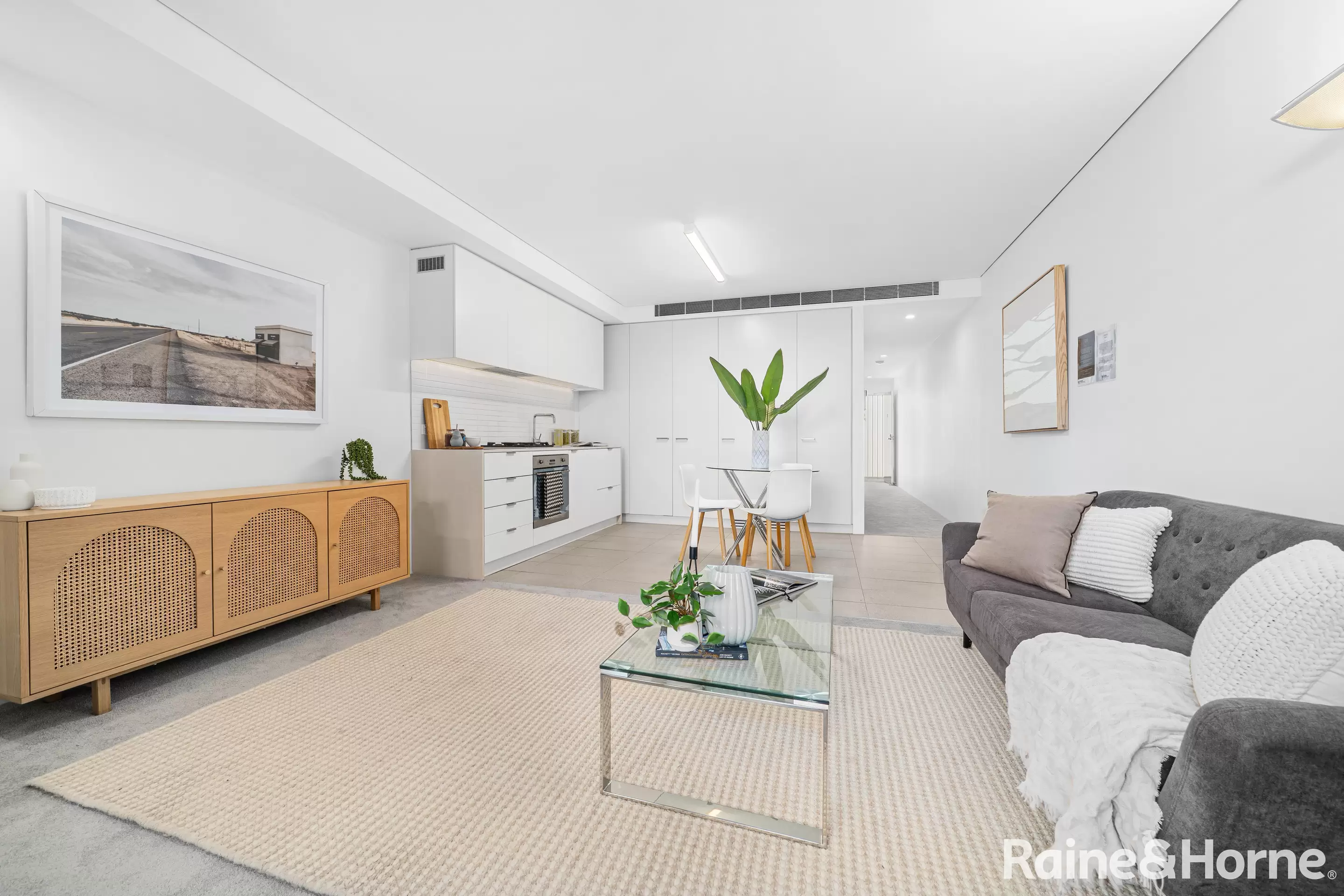 102/207 Barker Street, Randwick Auction by Raine & Horne Randwick | Coogee | Clovelly - image 1